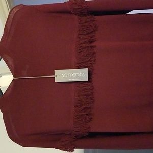 Long, merlot colored Eva Mendes dress